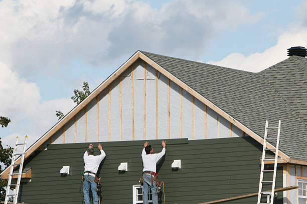 Professional Siding technician working in Hudson, NC